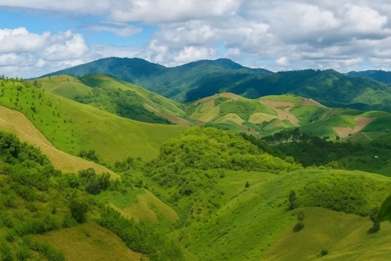Rural Chiang Rai hillside landscape representing low-trigger environments used in residential addiction treatment comparison
