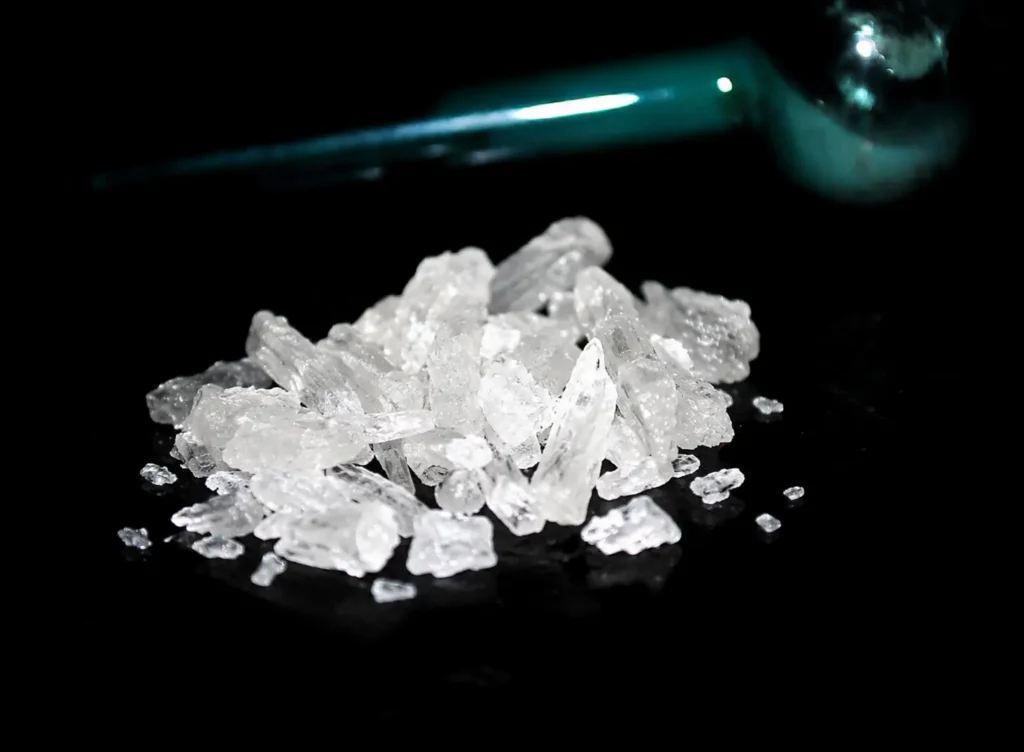 crystal meth ice drug sample contrasted with powder methamphetamine