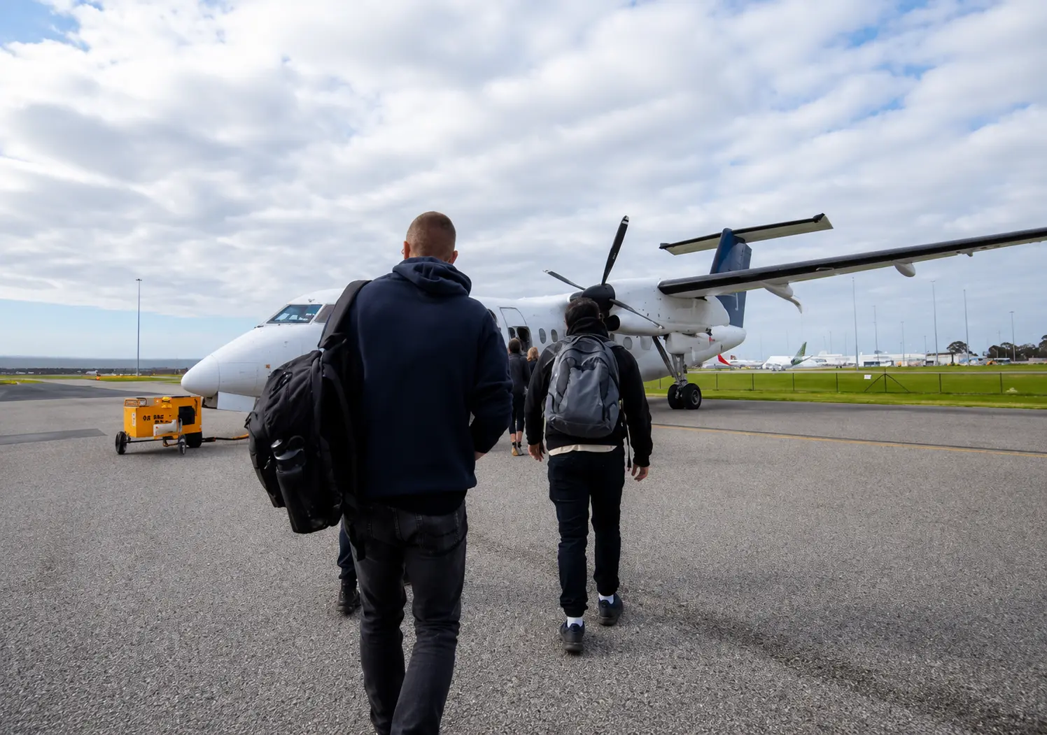 FIFO workers boarding a regional flight to a remote mining site in Australia