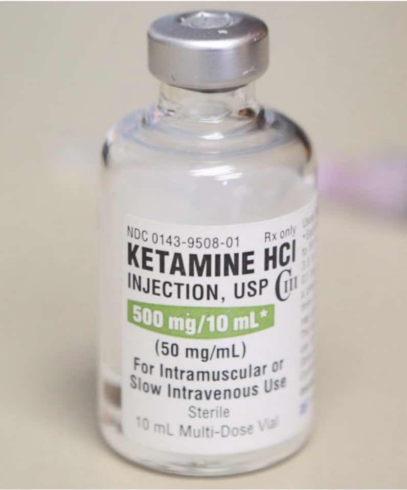 pharmaceutical bottle of ketamine depicting ketamine use