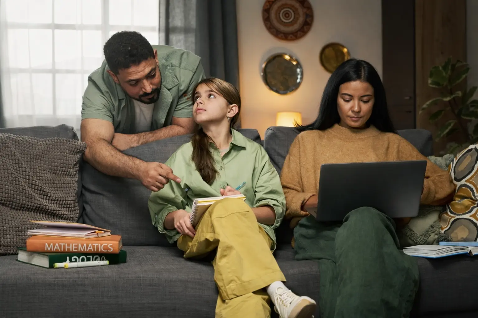 Middle Eastern family discussing an important decision at home symbolizing family involvement in seeking addiction treatment